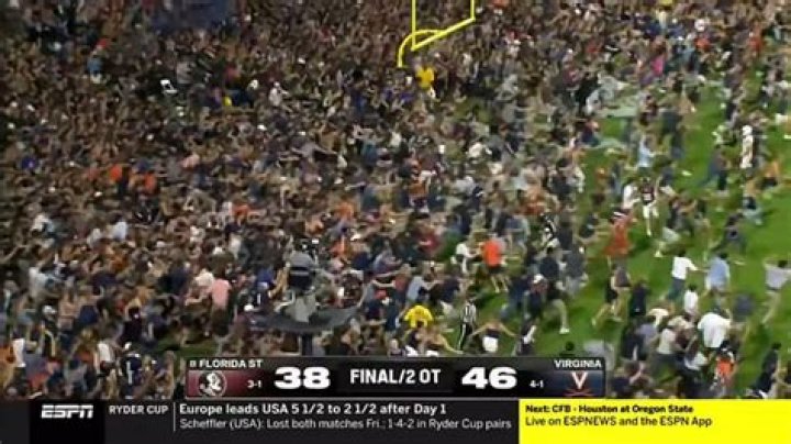 College football fans were blown away by Belleville star Adrian Walker Jr&rsquo;s behind-the-back interception during the Division I state championship game against Southfield