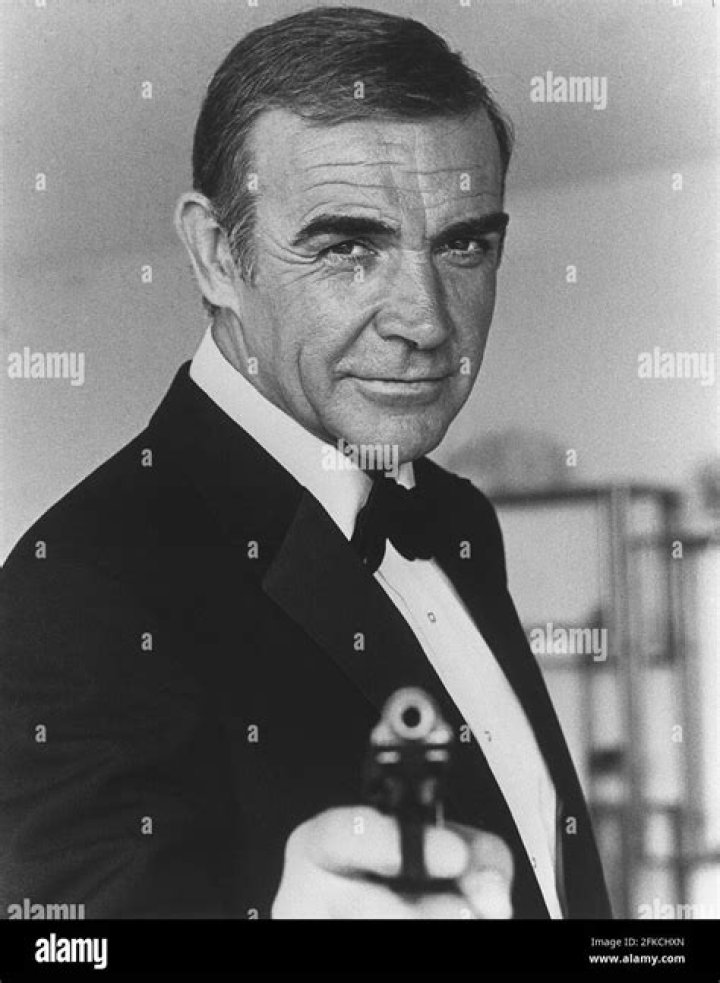 Connery with 007's Aston Martin DB5 in Goldfinger (1964)
