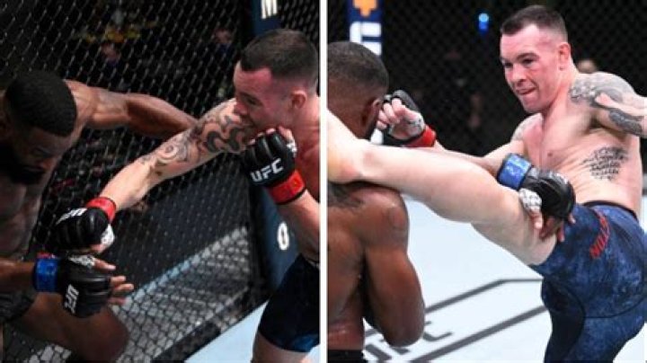 Covington (right) beat Woodley in the Octagon