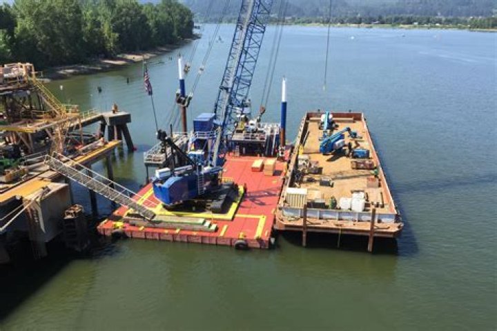 Cranes and barges are being used to search the lake