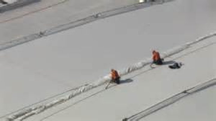 Crews are seen at the scene after the horrific accident