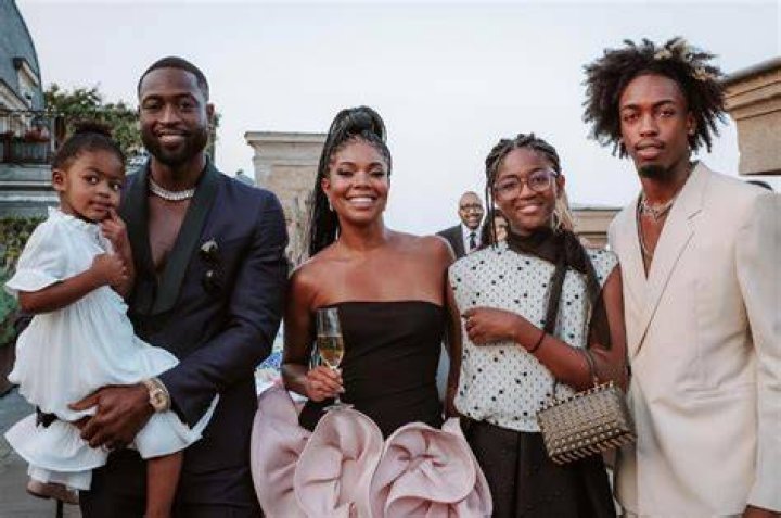 D Wade and his family at his final NBA game in 2019