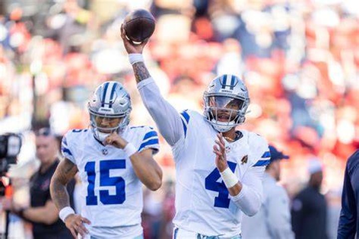  Dak Prescott, right, passes the ball against the Seattle Seahawks on December 24, 2017