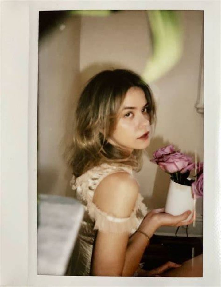 Dasha Nekrasova is pictured modelling one of the Red Scare 'ISIS' shirts