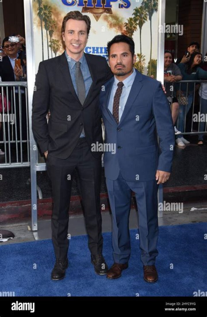 Dax Shepard and Michael Pena are taking a ride in a red Camaro in Los Angeles, California
