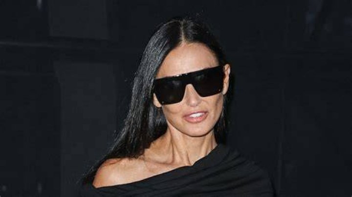Demi Moore suffered a major wardrobe malfunction while posing in a see-through dress in Paris