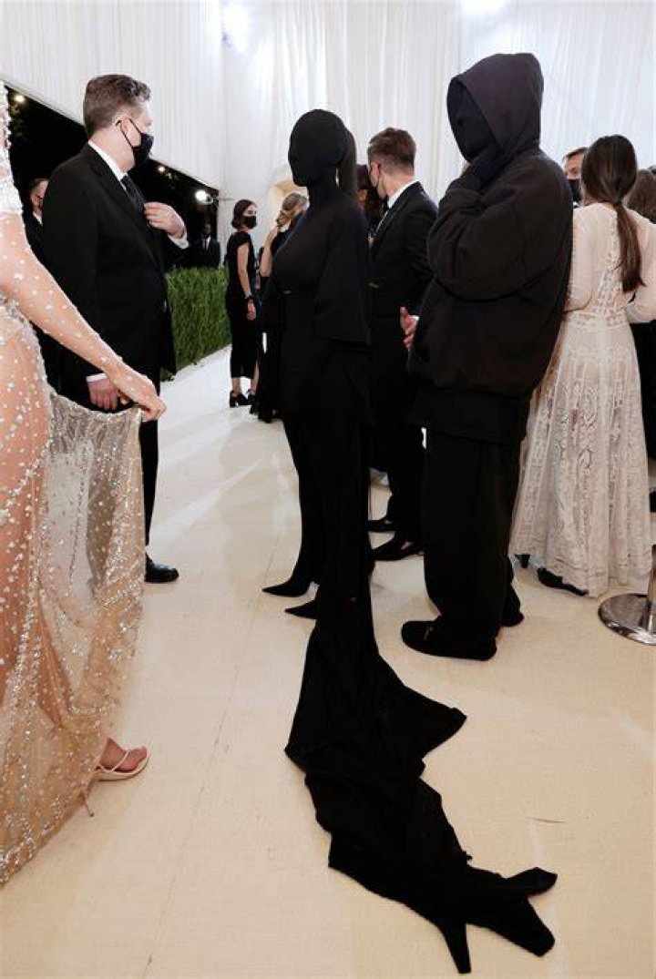 Demna matched the reality star in a mask as he joined her on the red carpet