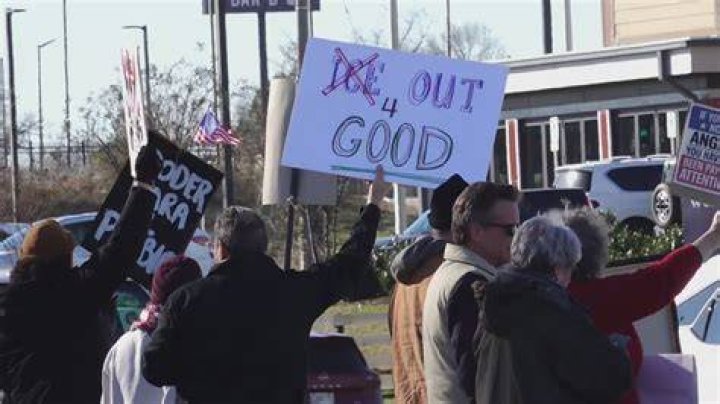 Demonstrators stood near the scene where the teen was fatally shot