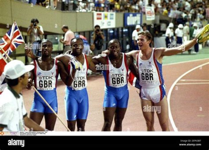 Derek Redmond, Roger Black, John Regis, and Kriss Akabusi celebrate winning gold in the 4x400m relay final at the 1991 World Championships in Tokyo