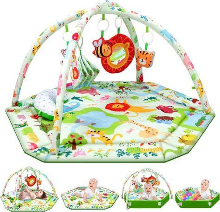 Detachable toys include a sun-shaped baby safe mirror, an elephant soft toy with a squeaker and a crinkle star