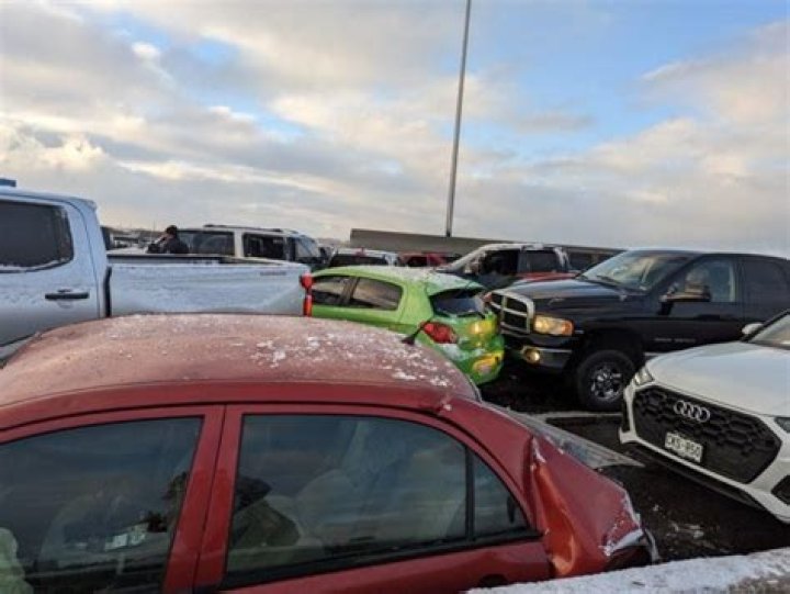 Dozens of cars were damaged by the flames, according to local reports