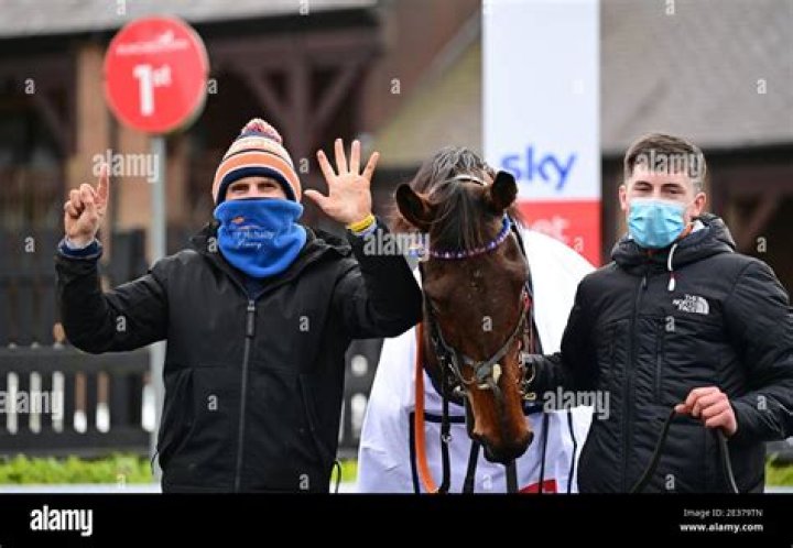 Dreal Deal with owner and trainer McNally (right), who has been banned from racing for what is believed to be a record 12 years