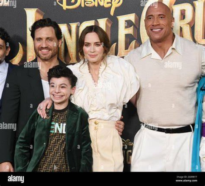 Dwayne Johnson, Raphael Alejandro, and Emily Blunt at Disneyland, California
