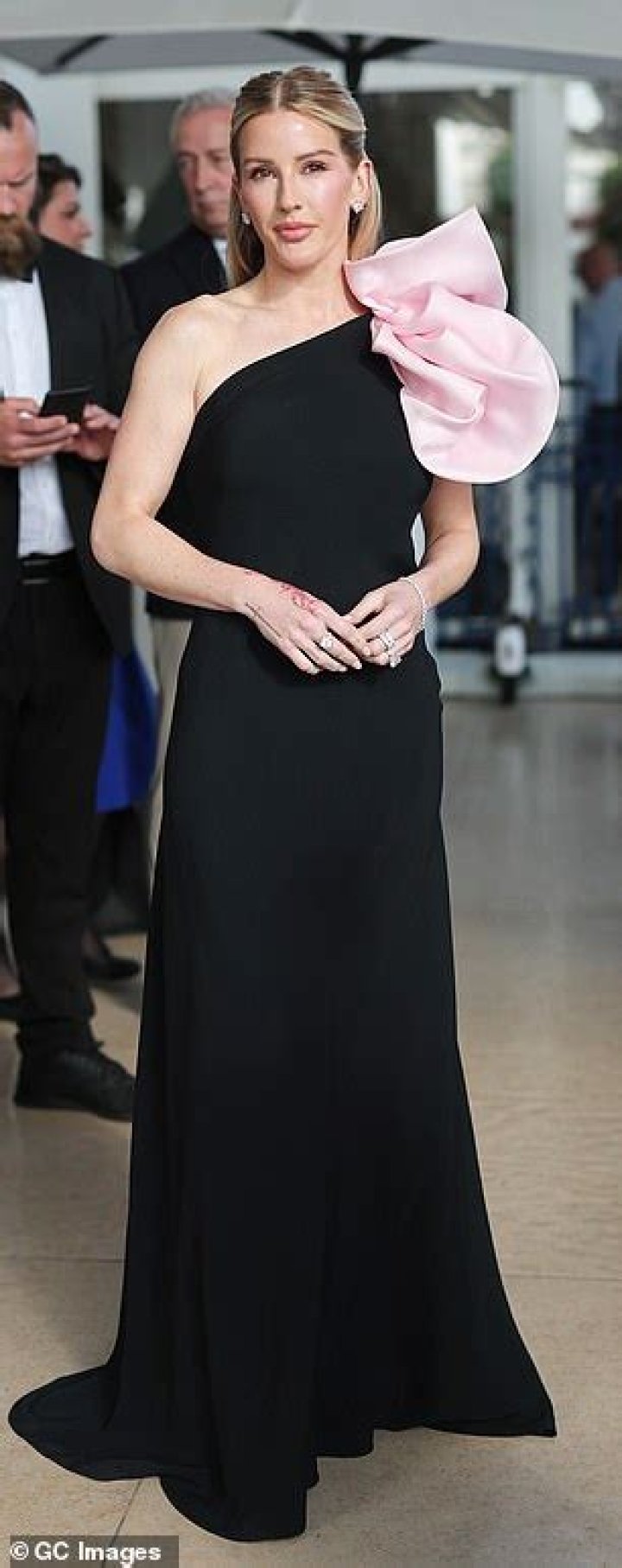 Ellie Goulding looked sensational in an orange silk dress for the Green Carpet Fashion Awards