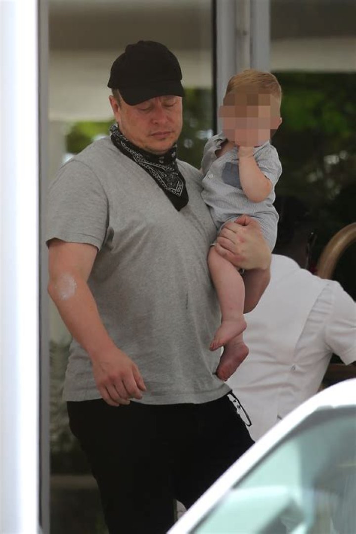 Elon carried the baby out
