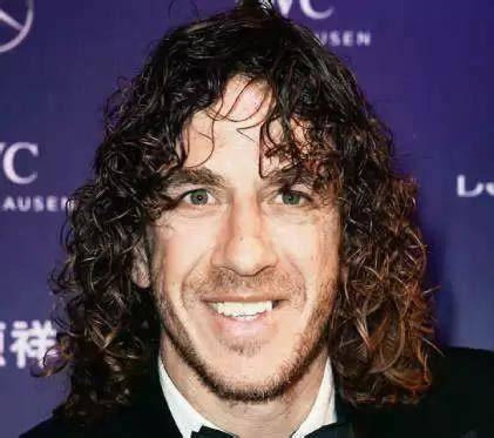  Ex-Barcelona skipper Carles Puyol with his wife, model Vanessa Lorenzo