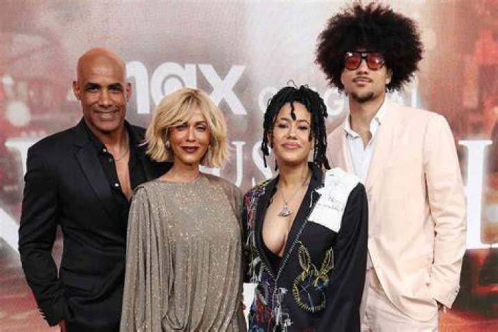 Family photo of Nicole, her husband Jionni, and their three children