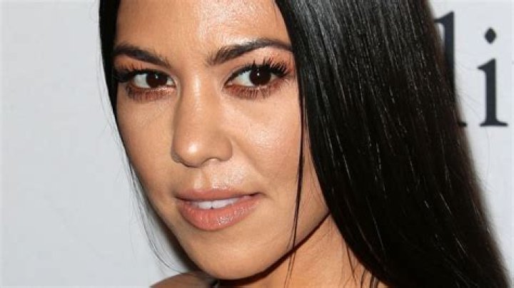 Fans are speculating that Kourtney Kardashian is pregnant with Travis Barker's baby