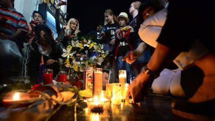  Fans lit dozens of candles for the late rapper
