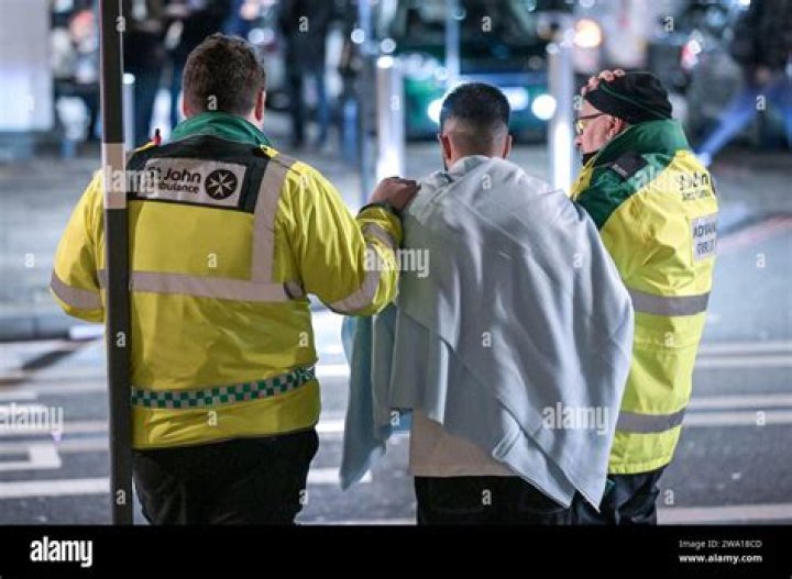 Fans spotted paramedics through the window in the background of this snap