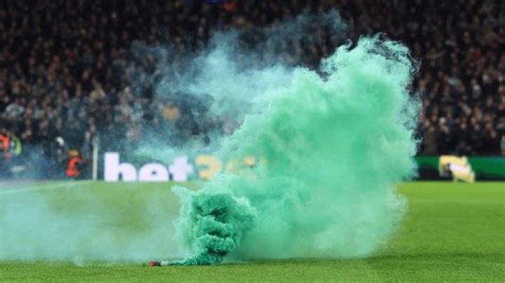 Fans were dabbing away sweat with their scarves in scorching temperatures