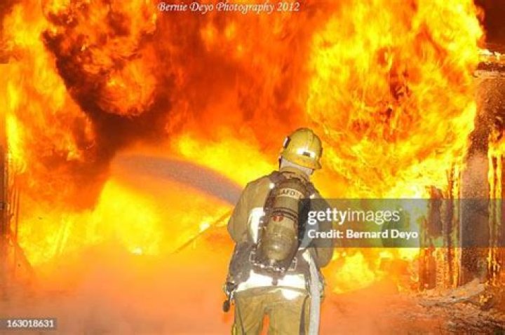 Flames spew out of 2 World Trade Center after it is struck by a commercial airliner in a terrorist attack on September 11, 2001
