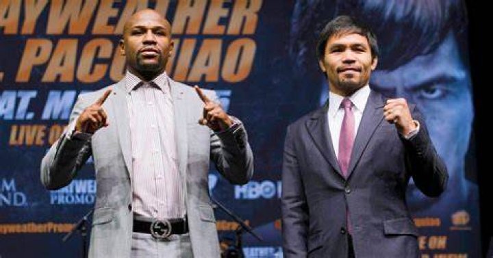 Floyd Mayweather pictured next to Donovan Cameron, and Sharif Rahman 