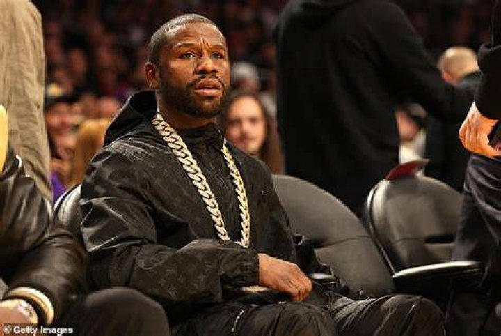  Floyd Mayweather stepped out in his &pound;13,400 mirrored jacket as he watched Gervonta David win the lightweight crown in Atlanta