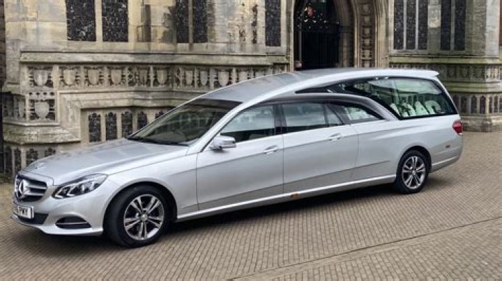 Funeral cars containing family members and Shane's beloved wife Victoria Mary Clarke followed the horse drawn carriage