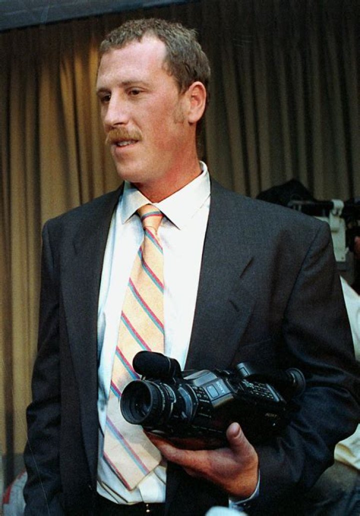 George Holliday holding the camera he used to capture the horrific beating in 1991