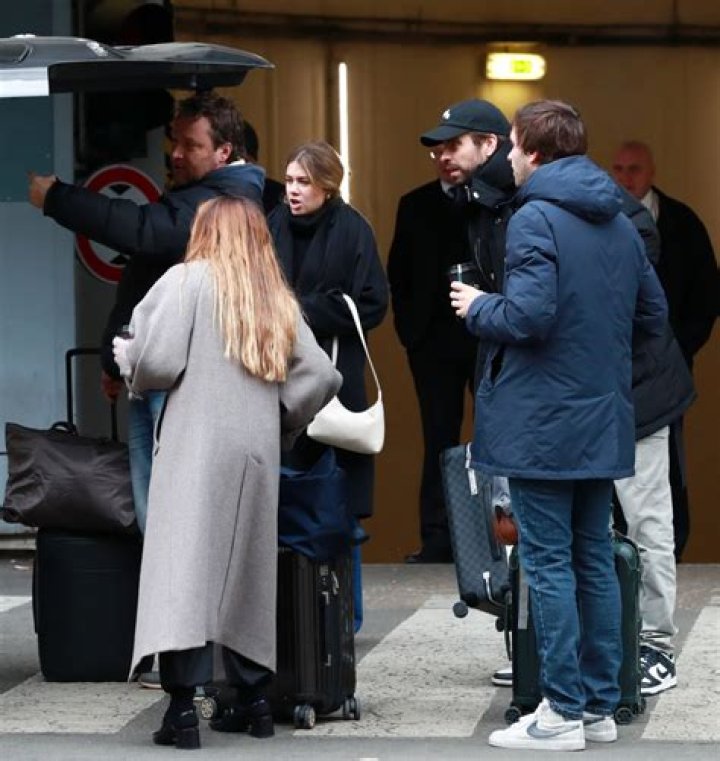 Gerard Pique leaving the Marriott Hotel in Prague with his girlfriend Clara