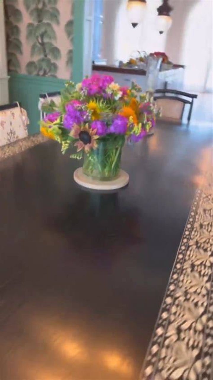 Gwen frequently films herself cutting the flowers and arranging them in her home