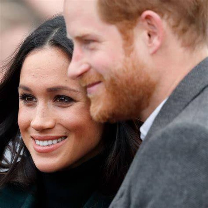 Harry and Meghan look like waxwork models in their magazine cover