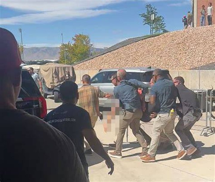 He rushed out of the courthouse and was whisked away in a Chevrolet Equinox