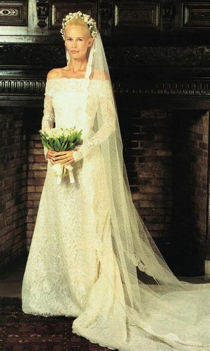 Her dress had a 16ft train and veil which was adorned with the flowers of the 53 commonwealth countries