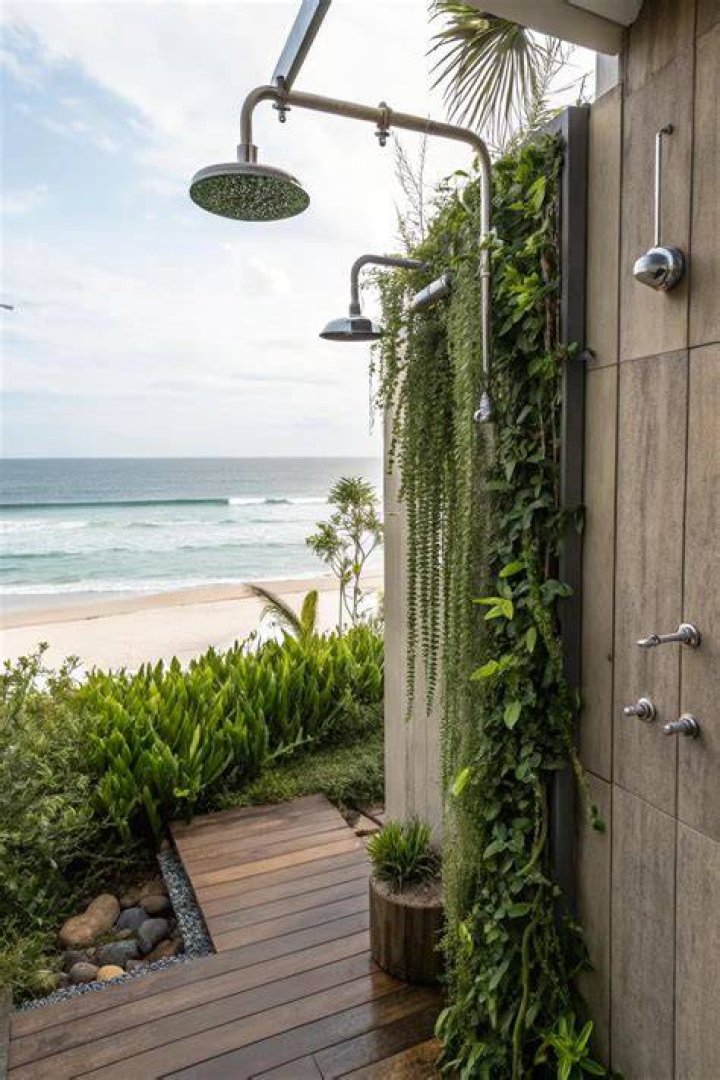 Her outdoor shower even has places to store her towels and soap
