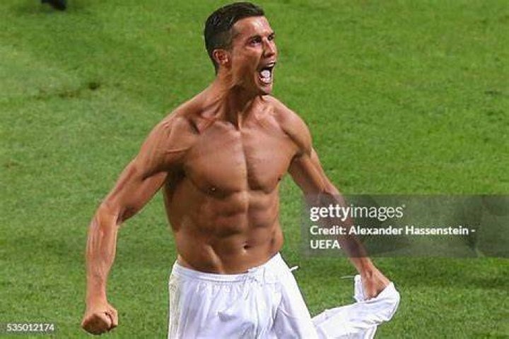 His shirt was off again after he broke his Spurs duck at Anfield