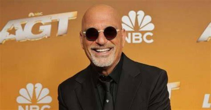 Howie Mandel joked that it was hard for him to get his hair under a baseball cap in a new clip