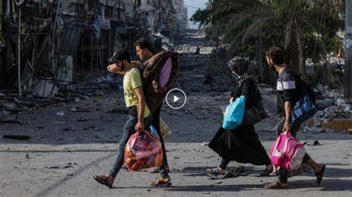 Hundreds were seen fleeing Hamas gunfire and jumping into cars in a desperate bid to escape