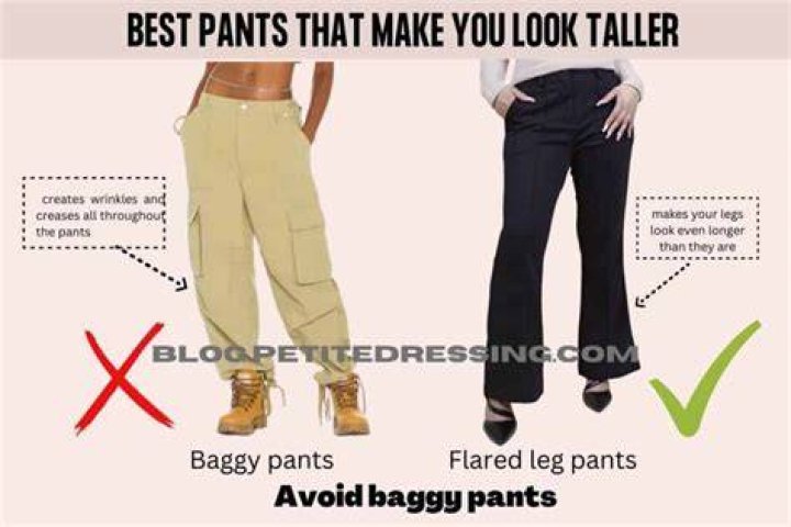 In baggier trousers while standing by the sea