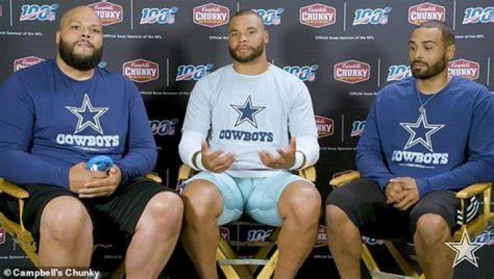  Jace Prescott, left, is pictured with his younger brother Dak, center, and their older brother Tad, right, in a press conference for Campbell's Chunky