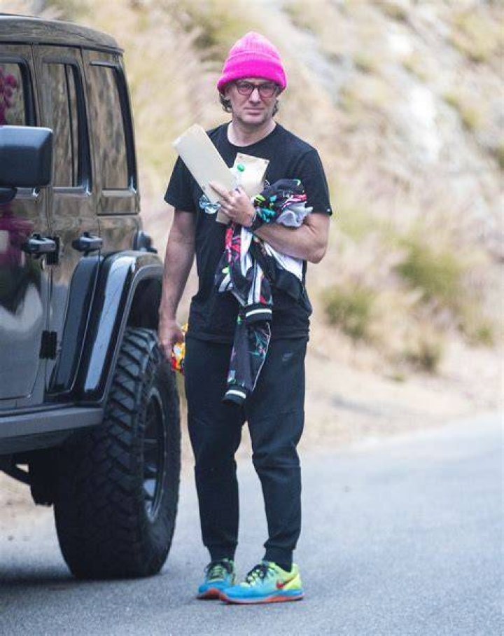 JC rocked a pink beanie, colorful shoes and jacket on his outing