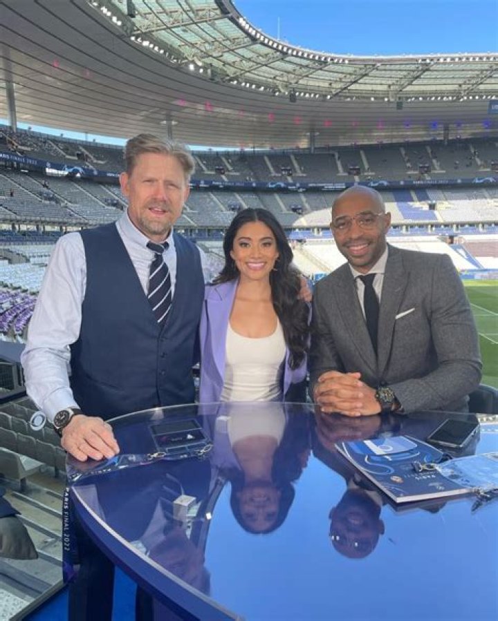 Jenny Chiu pictured with Peter Schmeichel and Thierry Henry at the Champions League final
