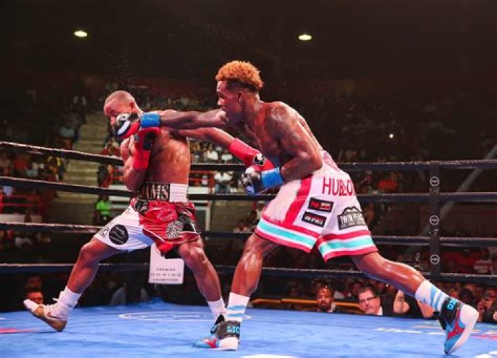 Jermall (R) remains undefeated with a 30-0 record, while Jermell (L) holds a 33-1 record