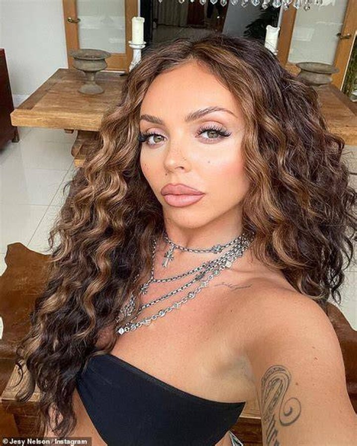 Jesy showed off her great figure in a black bra and blazer