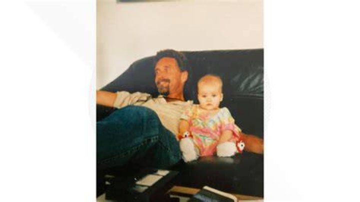 John McAfee with his daughter in 1974