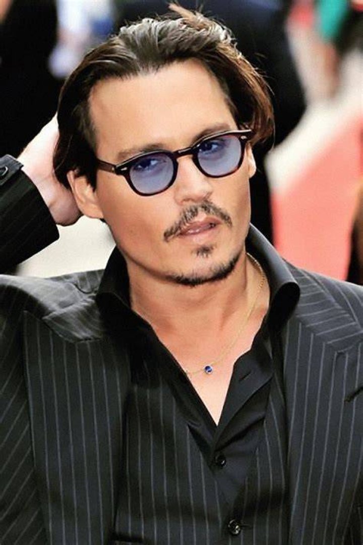 Johnny Depp wore sunglasses as he arrived at court to face his ex-wife