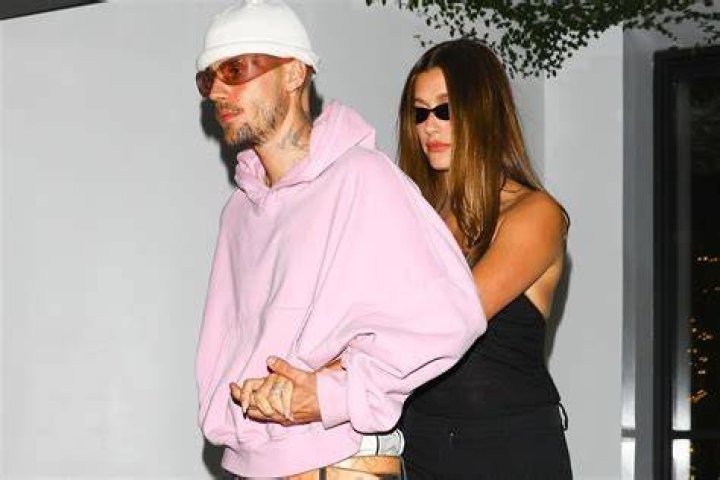 Justin and Hailey arrived together as Fred and Wilma Flinstone in costume