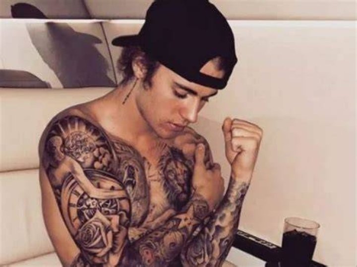 Justin Bieber arm tattoos