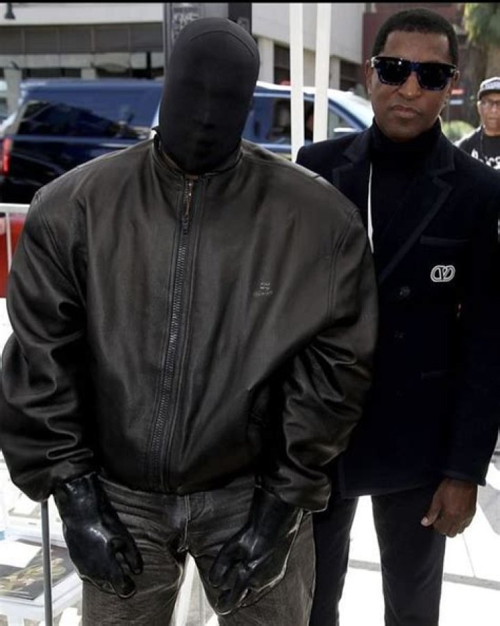 Kanye wore gloves and a face mask that covered his entire head
